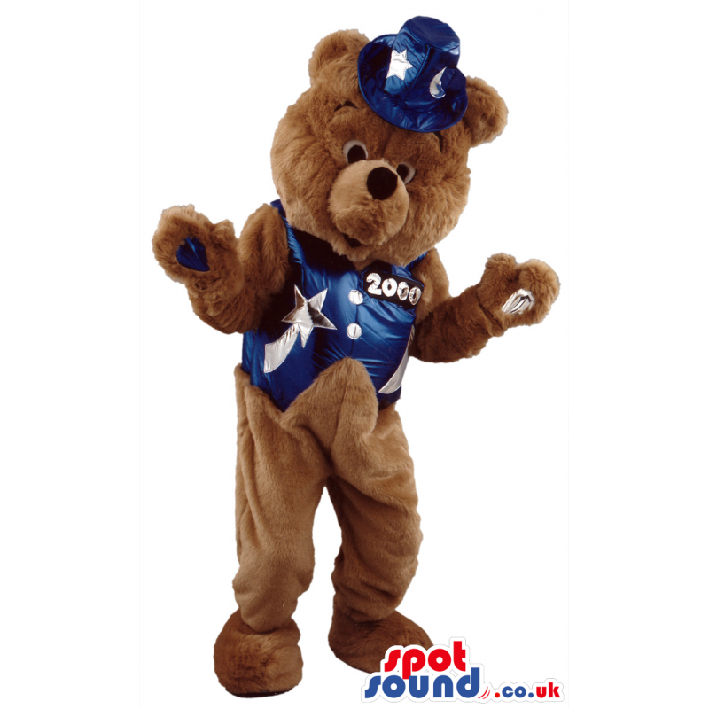 Teddy bear mascot wearing blue waistcoat with moons and stars -