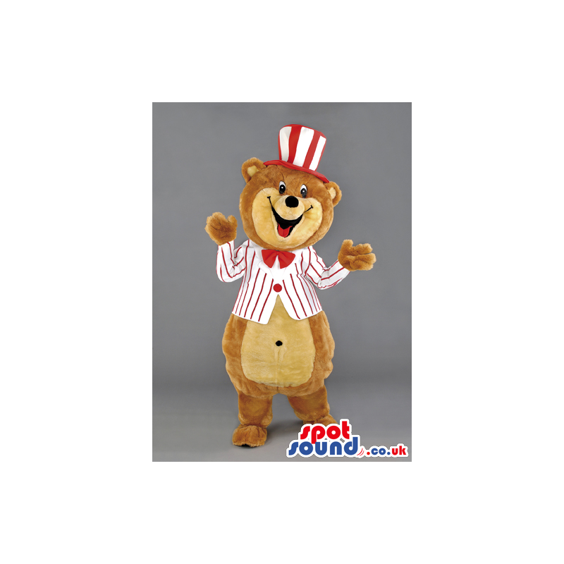 Overjoyed teddy bear mascot with red bow tie and striped hat -