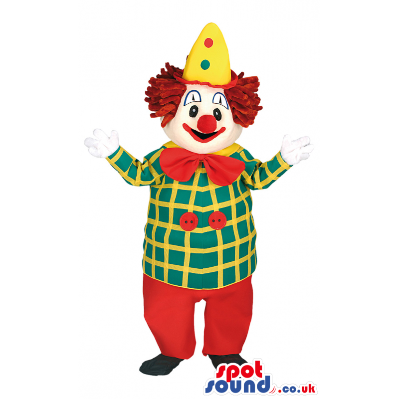 Lively smiling clown mascot with colorful outfit and red bow