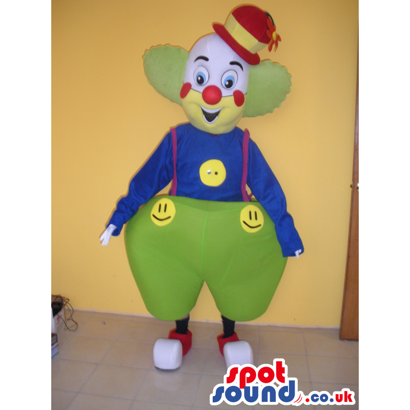 Colorful Clown Mascot Wearing Big Pants And Smiley Faces -