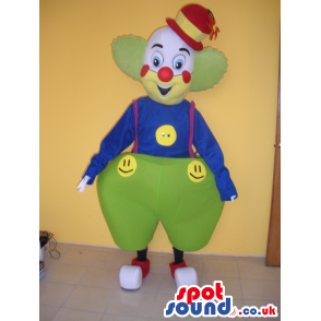 Colorful Clown Mascot Wearing Big Pants And Smiley Faces -