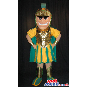 Angry Roman Soldier Human Mascot In Yellow And Green Clothes -