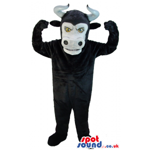 Furious looking black bull mascot with white face and  horns