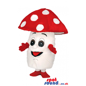 Glad looking white mushroom with red head and white polka dot -