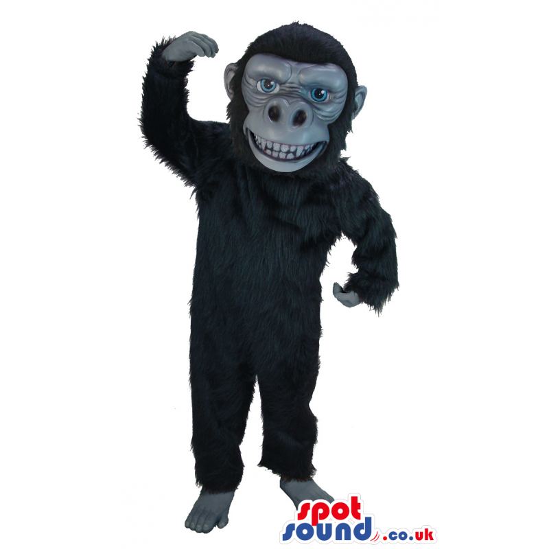 Black orangutan mascot with soft black fur and large grin -