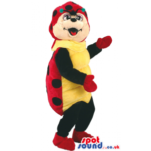 Jolly looking ladybird mascot with red gloves and shoes