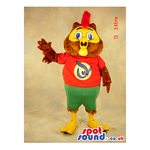 Brown Owl Plush Mascot Wearing A Red And Green Shorts - Custom