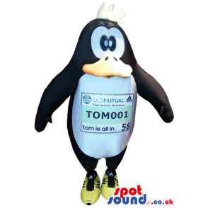Funny Cartoon Penguin Plush Mascot With A Label On Its Belly -