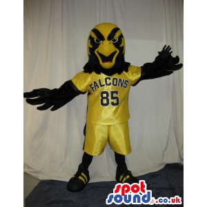 Black And Yellow Eagle Plush Mascot Wearing Sports Clothes -
