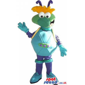 Cosmic Green Creature Mascot In Blue Clothes And Orange Hair -