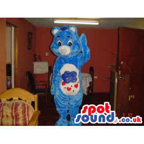 Funny blue bear mascot with cloud raining hearts on its belly -