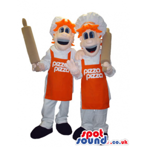 Orange-Haired Couple Mascot Wearing Cook'S Hats And Aprons -