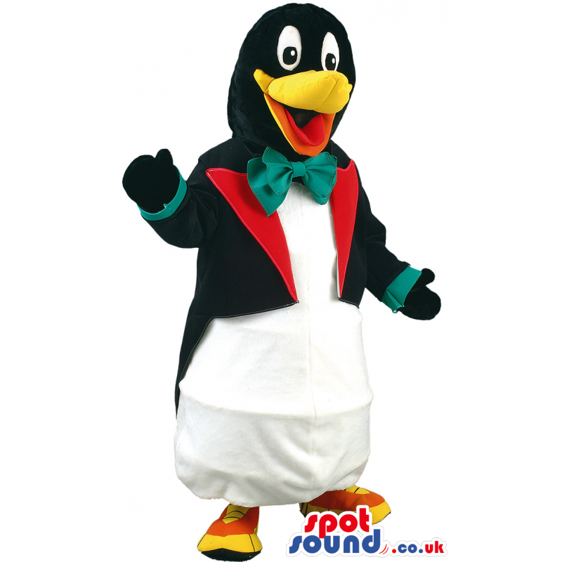 Upbeat penguin mascot wearing a black tuxedo with red collar -