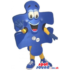 Big Blue Jigsaw Puzzle Mascot With Logos And Funny Face -
