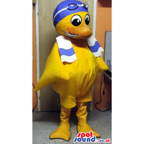 Yellow Duck Plush Mascot Wearing Blue Swimming Gear And A Towel