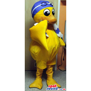 Yellow Duck Plush Mascot Wearing Blue Swimming Gear And A Towel