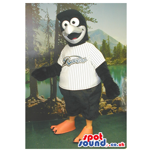 Black Bird Plush Mascot Wearing A Baseball Shirt With A Team