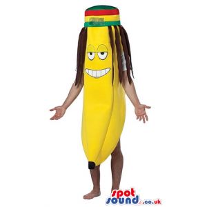 Cool Banana Mascot Wearing A Jamaican Hat And Rasta Dreadlocks