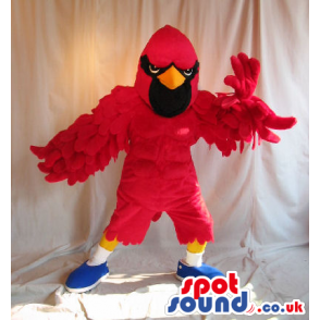 Red Bird Plush Mascot With A Black Face Wearing Sneakers -