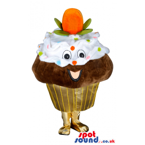 Pleased golden cupcake mascot with cream and fruits toppings