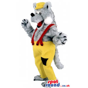 Fluffy grey wolf wearing yellowcap and trousers with black