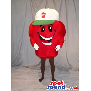 Funny Red Berry Fruit Mascot With A Cute Face In A Cap With