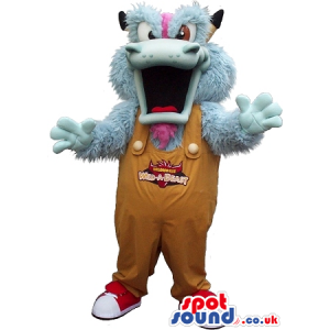 Blue Monster Plush Mascot With A Big Mouth In Overalls With