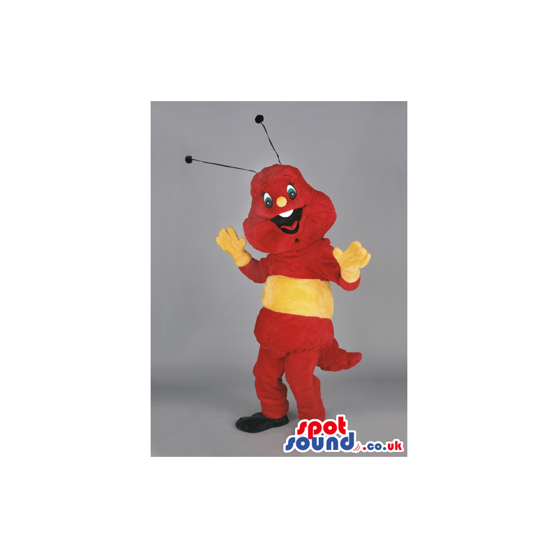 Cheerful red and yellow insect mascot with black feet and