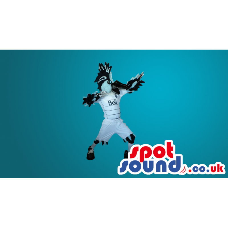 White And Black Bird Mascot In White Sports Clothes With Logo -