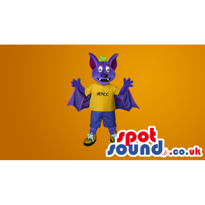 Purple Fantasy Bat Plus Mascot Wearing A Yellow T-Shirt -