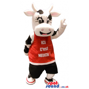 Black And White Cow Plush Mascot Wearing A Red Shirt With