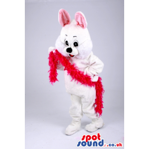 White rabbit mascot with pink ears and red fluffy garlands