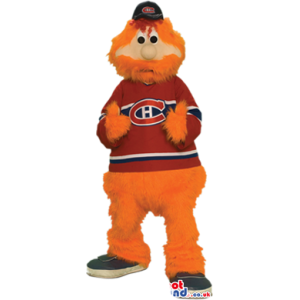 Orange Hairy Mascot Wearing A Red Shirt With A Logo - Custom