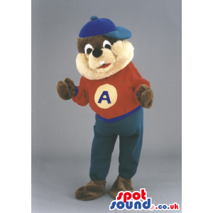 Bear mascot wearing urban T-shirt, blue hat and trousers -
