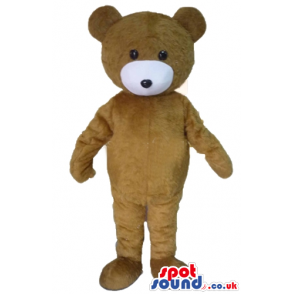 Brown teddy bear with white mouth, round ears and black eyes -