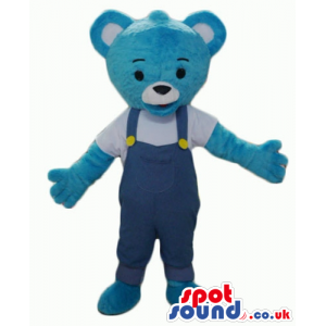 Smiling light blue teddy bear in blue gardener trousers and