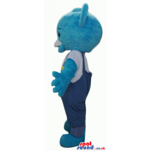 Smiling light blue teddy bear in blue gardener trousers and