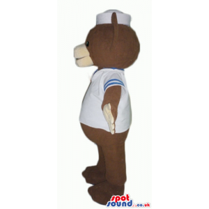 Chocolate brown teddy bear with light brown hands in white