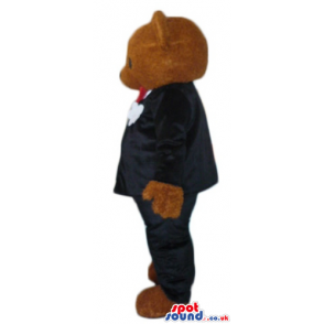 Chocolate brown teddy bear dressed like a groom with red bow