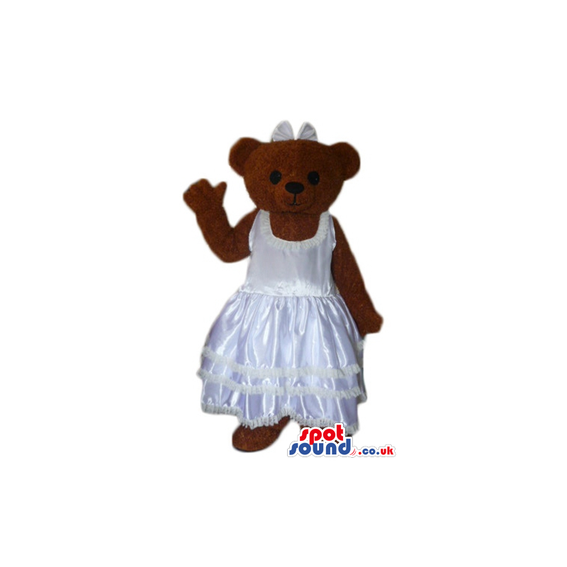 Chocolate brown teddy bear in silky white wedding dress -