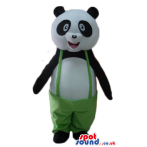 Smiling panda bear mascot dressed in green trousers - Custom