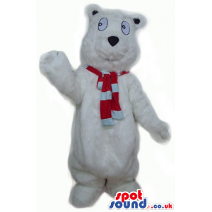 White bear with big eyes wearing a striped red and white scarf