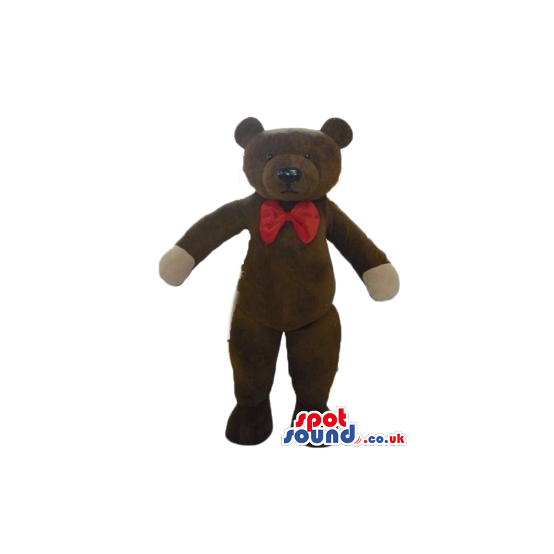 Serious brown teddy bear with beige hands and red bow tie -