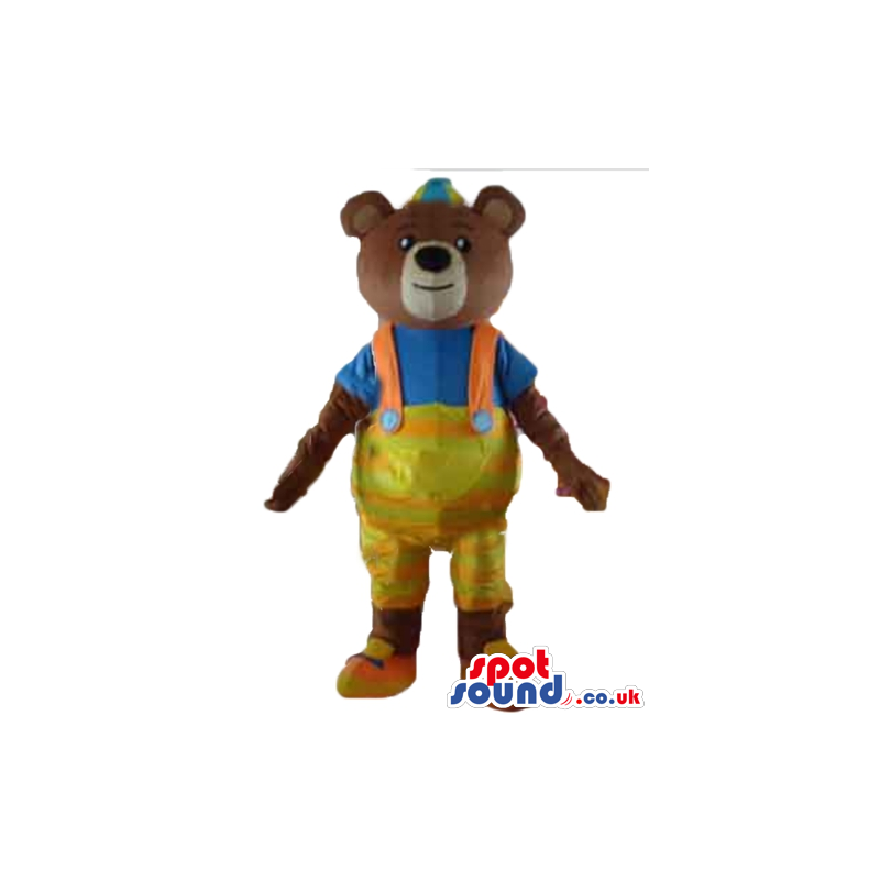 Happy brown bear in blue t-shirt and lime green and orange