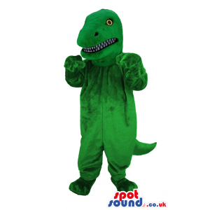 Green roaring dinosaur with yellow eyes and sharp teeth -