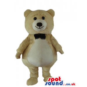 Smiling beige bear with white belly and white detail round the