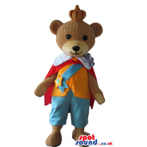 Brown bear dressed like a king with light blue trousers, orange