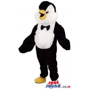 Penguin -like mascot in black and white with a cute smile -