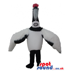 Bird mascot with white body, black legs, black and white head