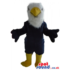 Black eagle mascot with a white head, a yellow beak and yellow
